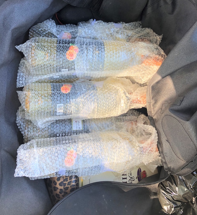 Wine wrapped in bubble wrap in tour pack