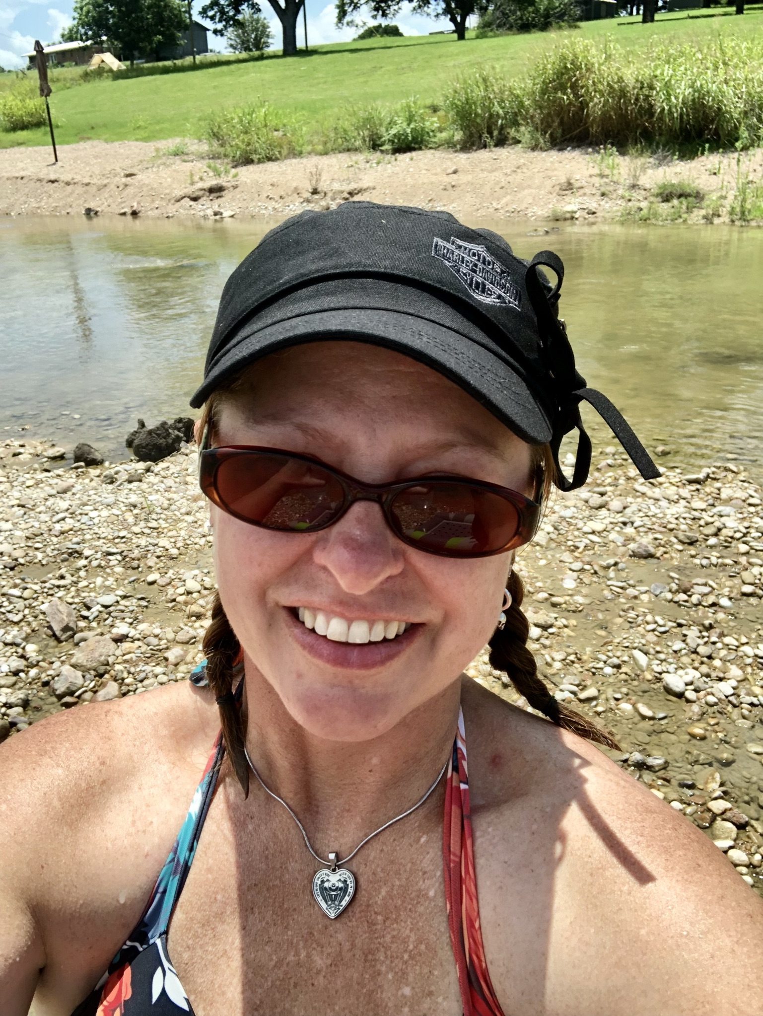 Ros Alainn, Red Head,, hat, sunglasses, standing in a river
